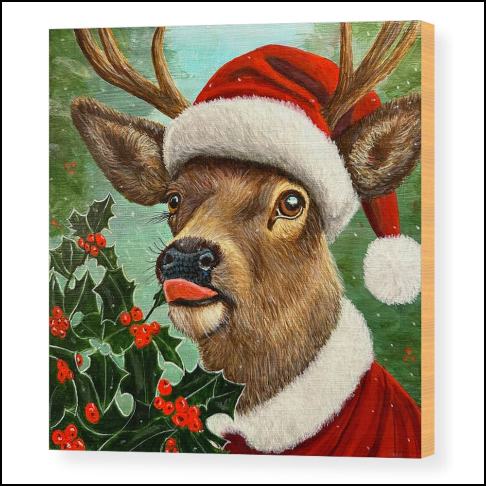 A wood panel print featuring a satirical painting of a deer dressed in a red Santa hat and coat eating a garden holly bush.