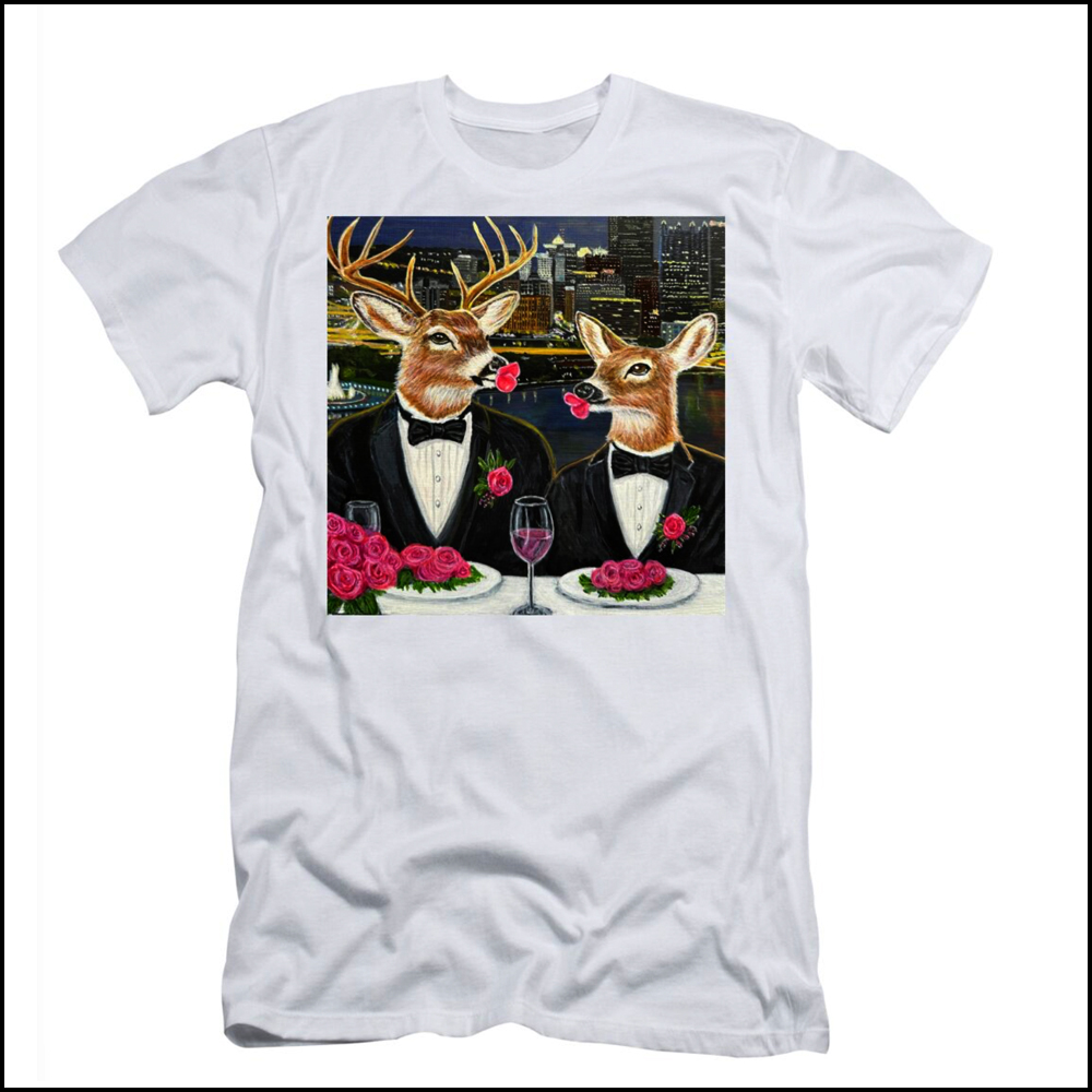 A white t-shirt featuring a satirical painting of deer eating prized garden roses with the Pittsburgh city skyline visible in the background.