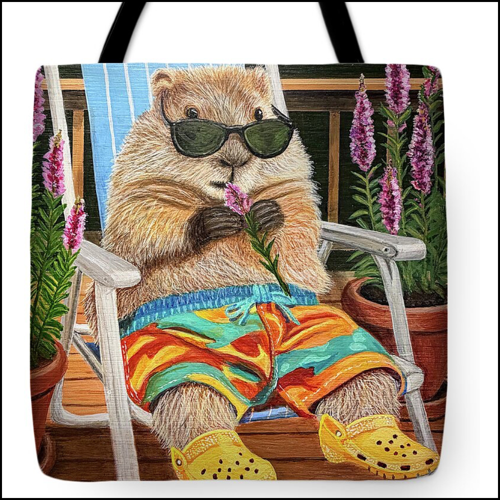A fabric tote bag featuring a satirical painting of a groundhog wearing swimming trunks and sunglasses, caught munching on purple loosestrife.